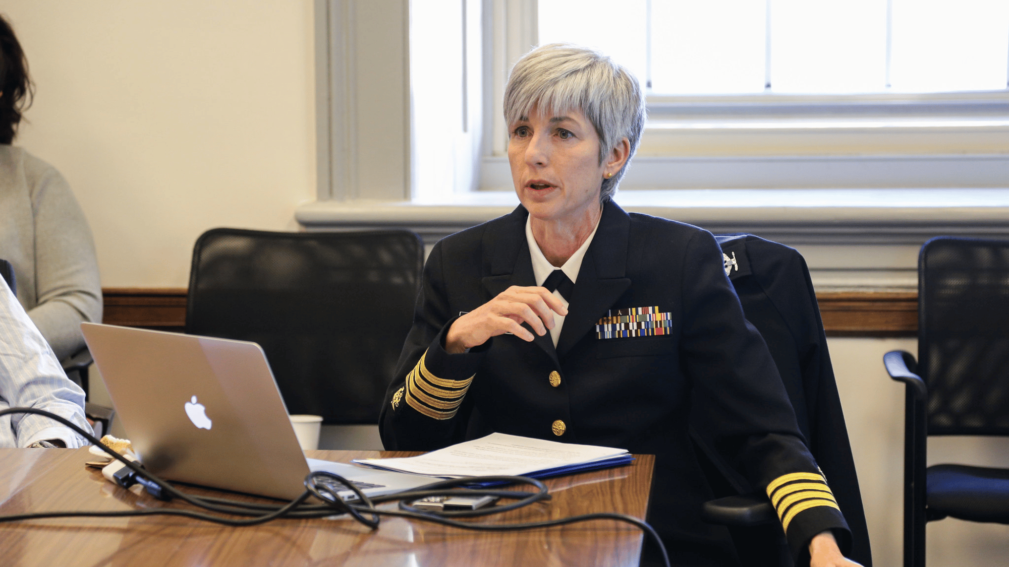 Captain Nancy Knight, M.D. speaking.
