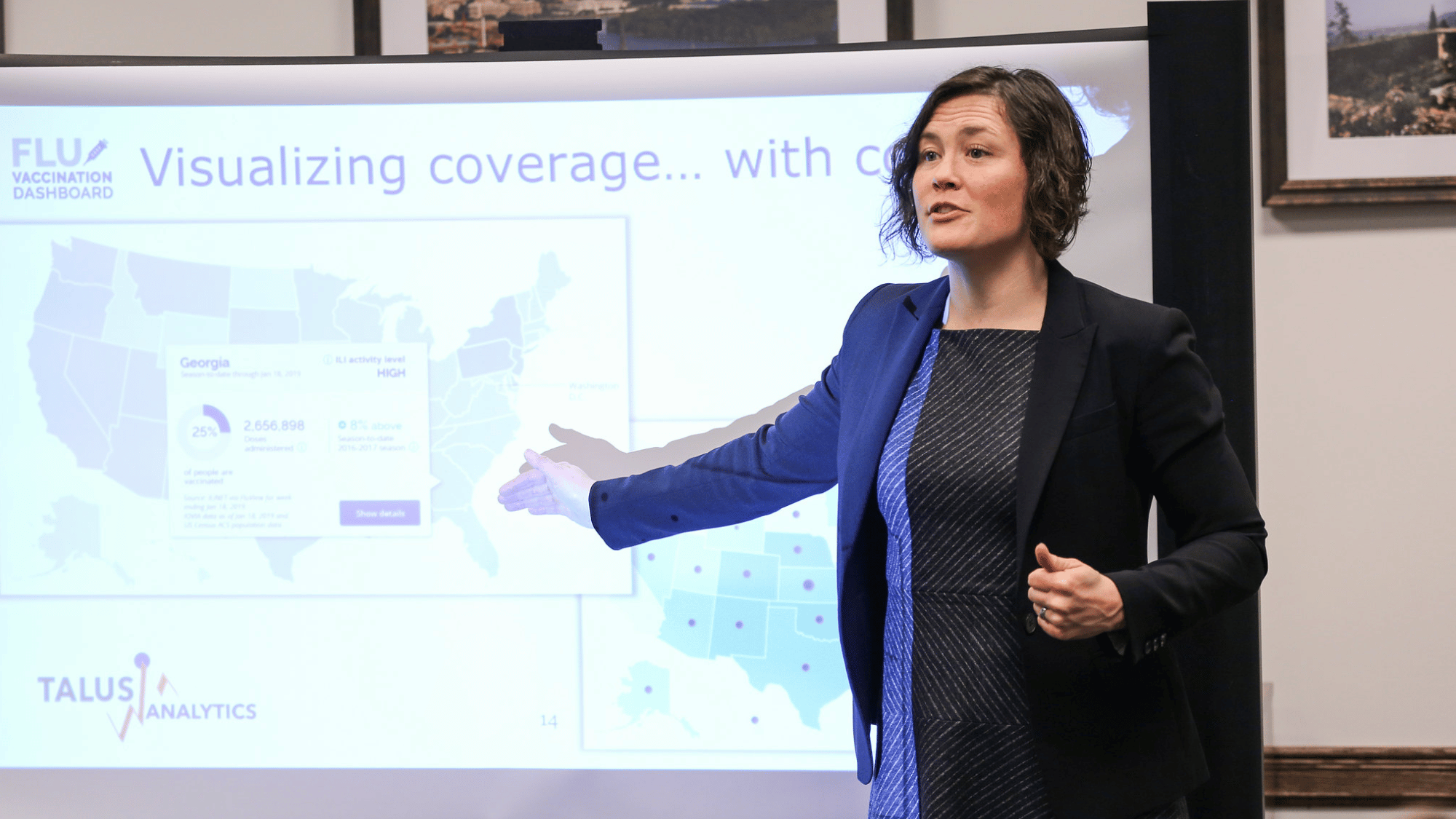 Ellie Graeden, Ph.D. giving a presentation.