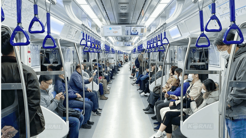 People wearing masks on a train in South Korea.