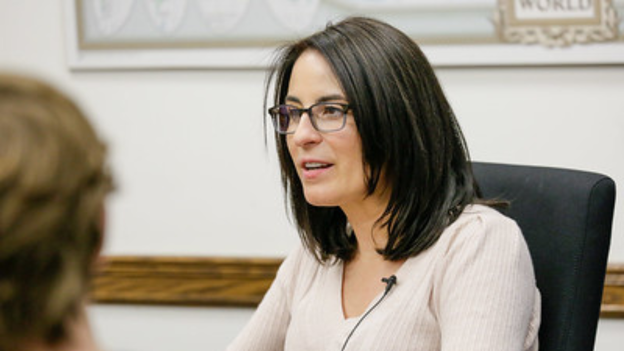 Katie Keith speaking at a Georgetown University Conversations in Health event.