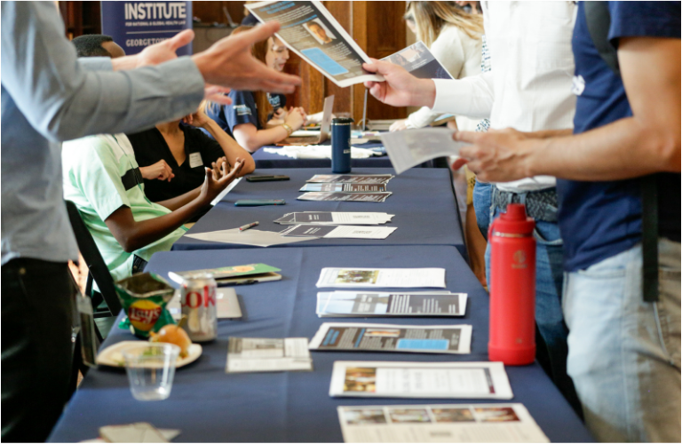 Multiple flyers spread across tables