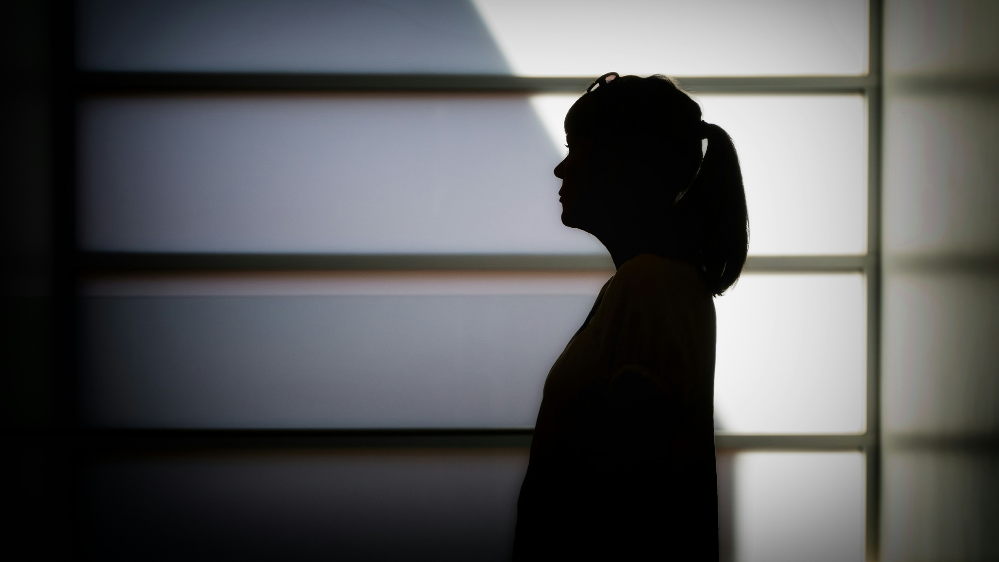 Silhouette of a woman.