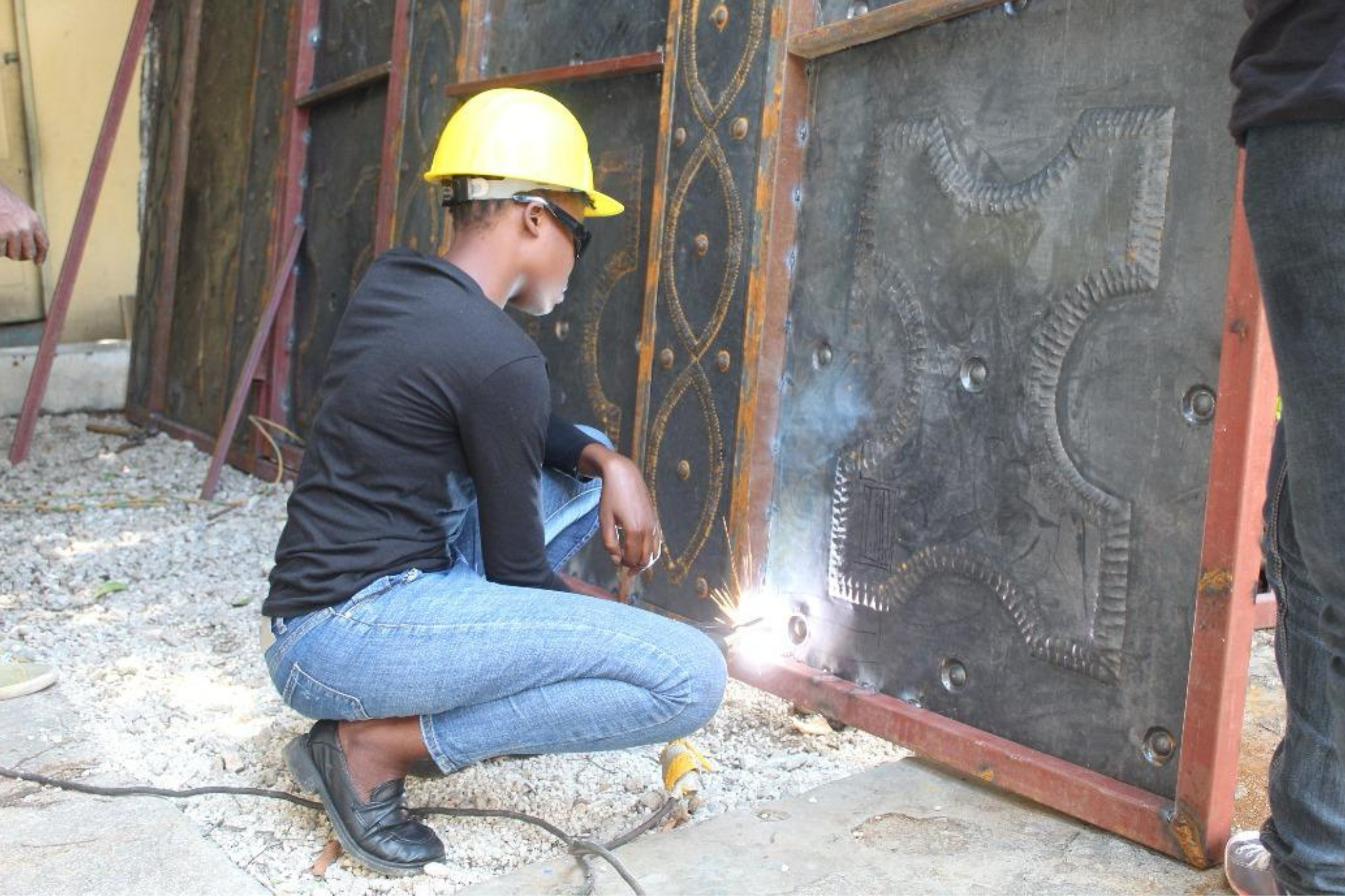 A person welding 